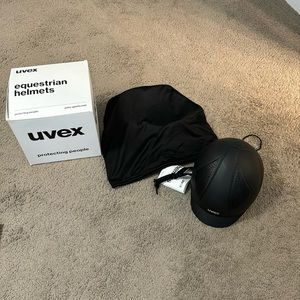 Brand new NEVER used Uvex Helmet. Black mat L/XL
